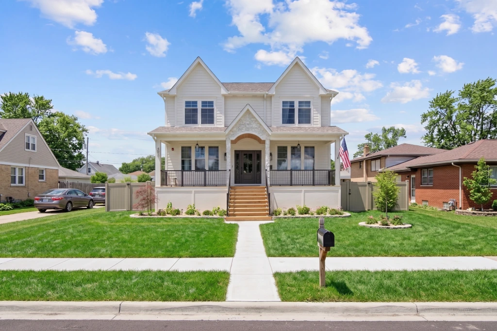 Contemporary White Siding House with Elevated Porch Sidewalk and Lawn.jpg