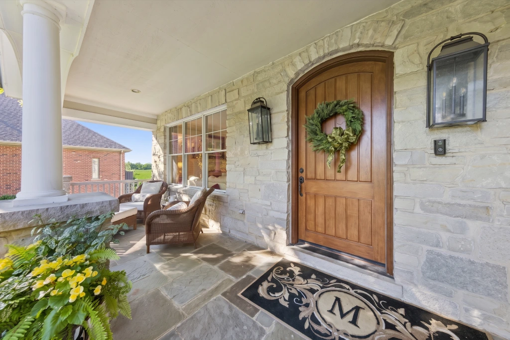 Stone Front Porch Wooden Entry Door.jpg